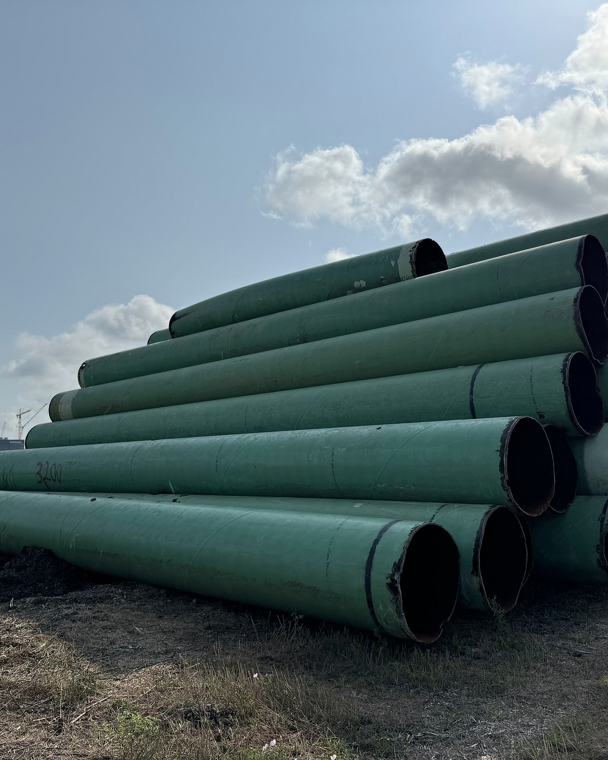 Stacked coated line pipe in the yard